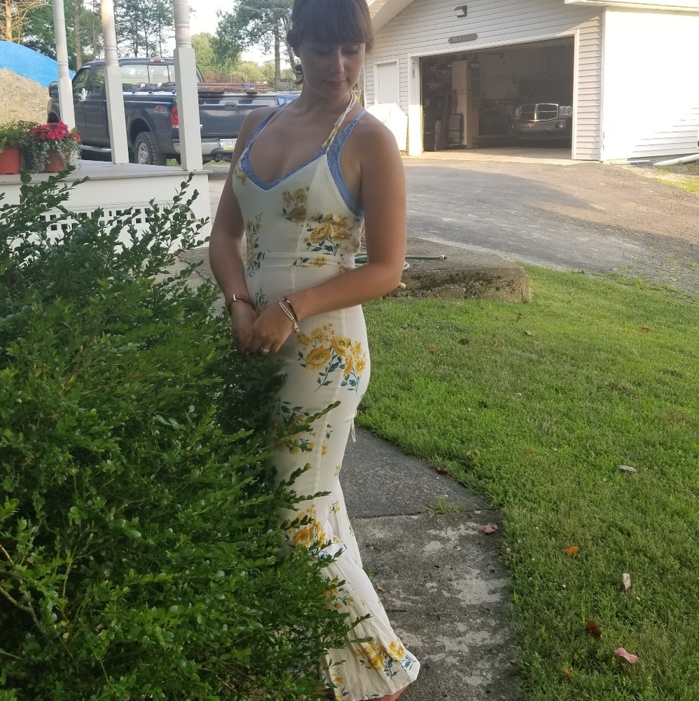 ON HOLD White bell bottom floral jumpsuit